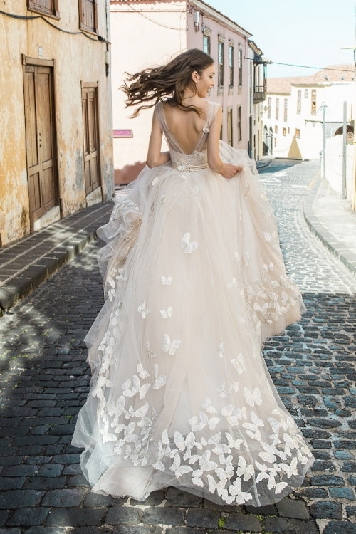 Robe de mariée papillons